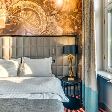 Grand Poet Hotel And Spa By Semarah Riga Ngoại thất bức ảnh A room at the hotel