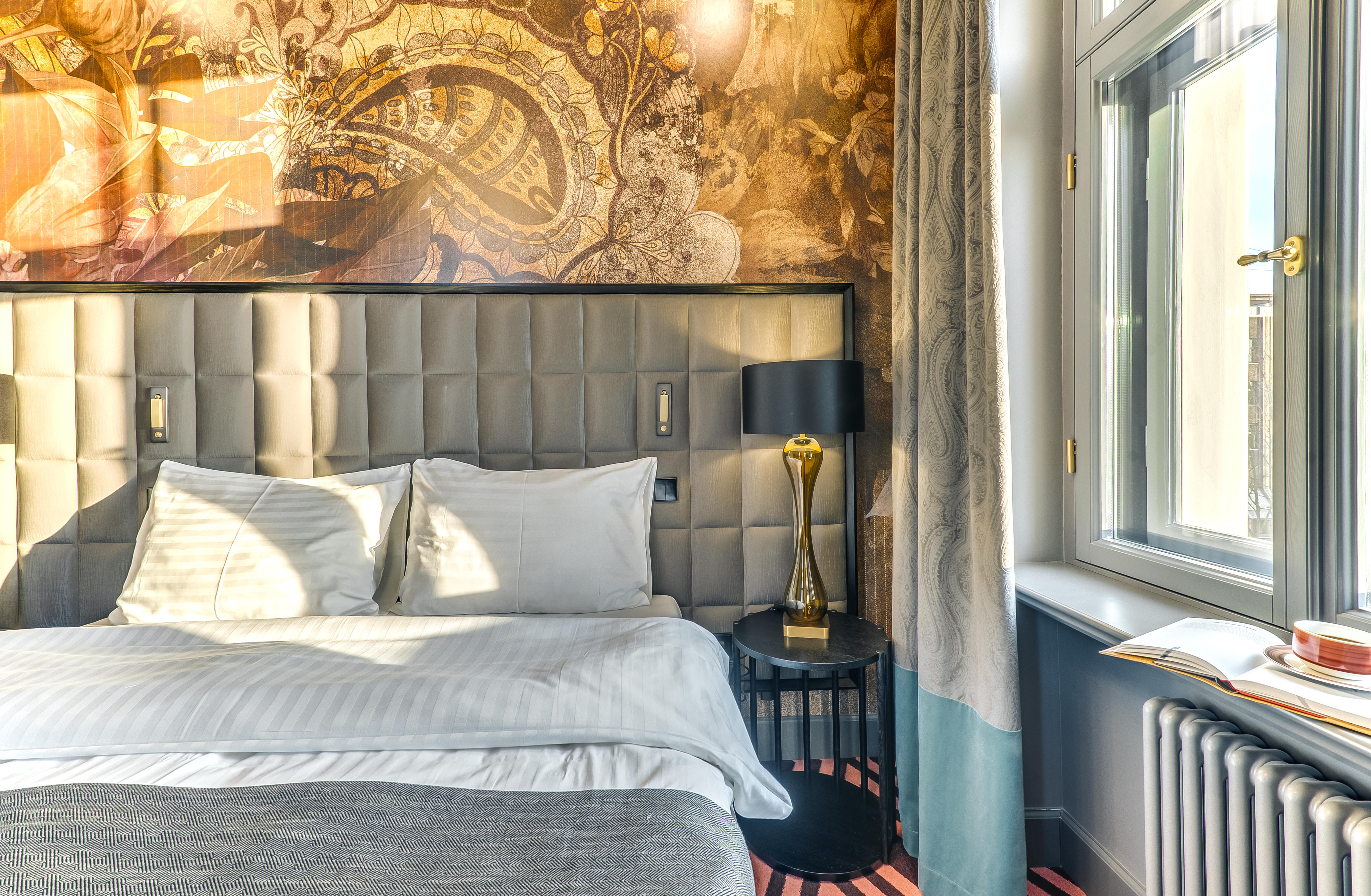 Grand Poet Hotel And Spa By Semarah Riga Ngoại thất bức ảnh A room at the hotel