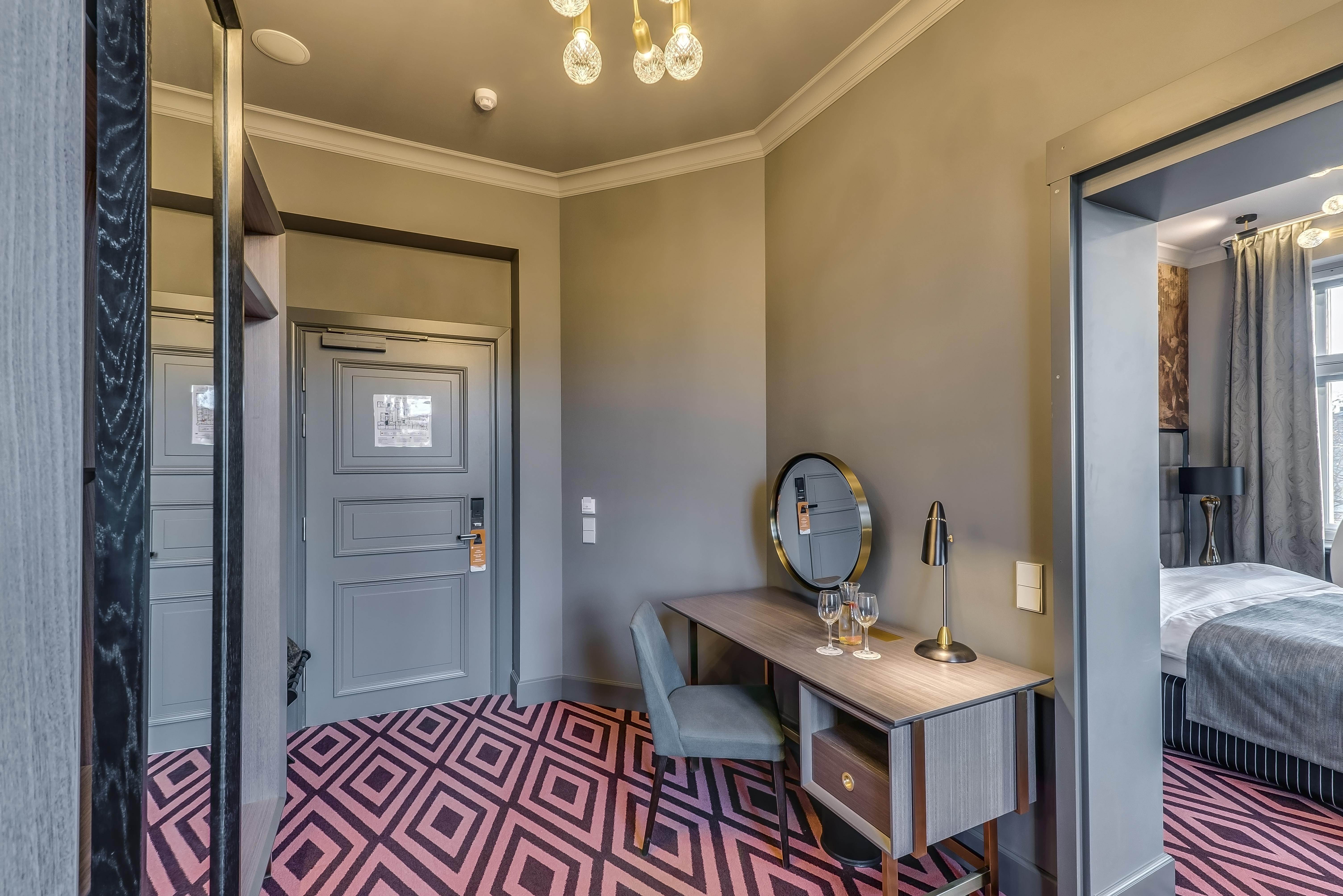 Grand Poet Hotel And Spa By Semarah Riga Ngoại thất bức ảnh A room at the hotel