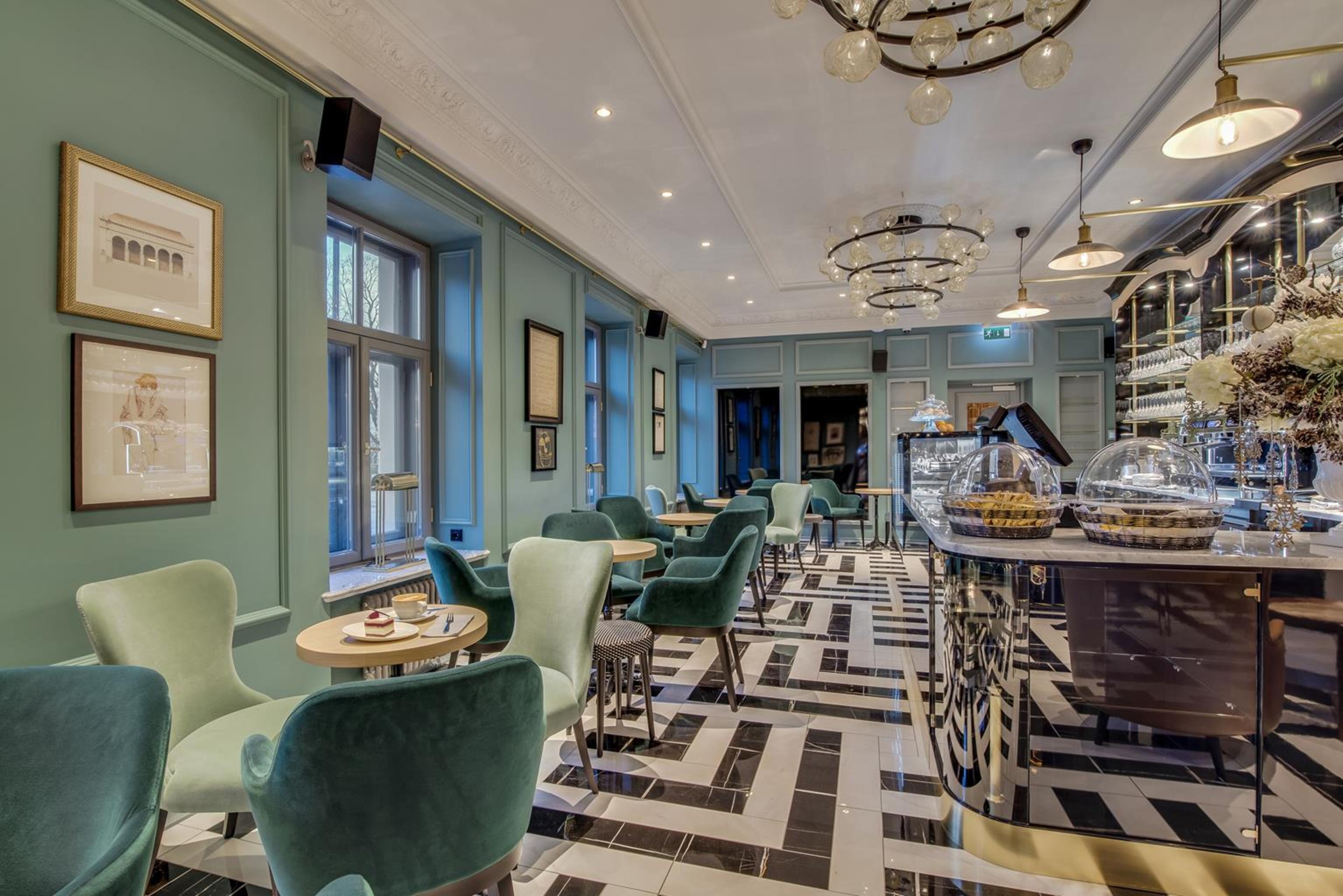 Grand Poet Hotel And Spa By Semarah Riga Ngoại thất bức ảnh The interior of the restaurant