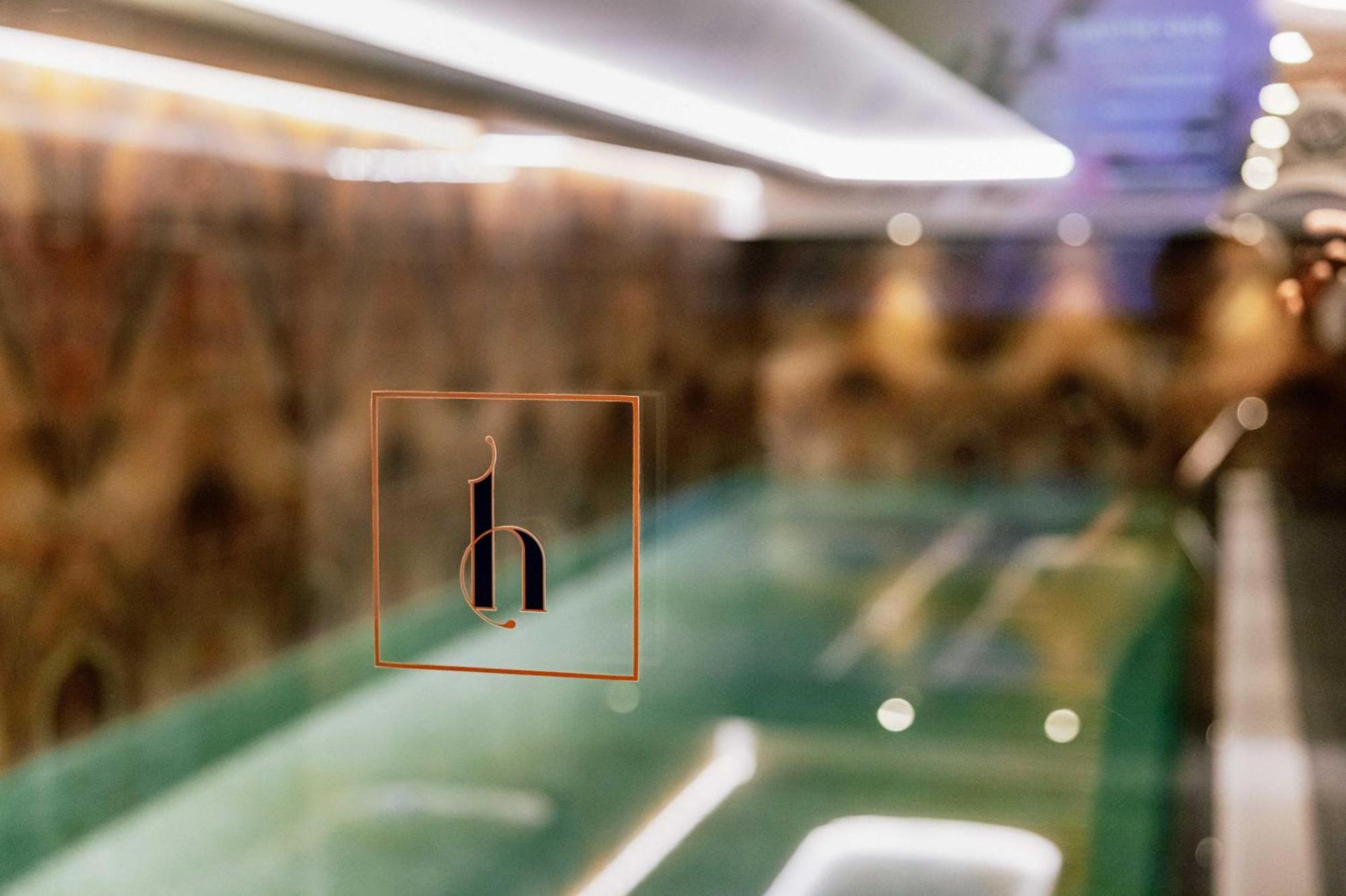 Grand Poet Hotel And Spa By Semarah Riga Ngoại thất bức ảnh The logo of the hotel