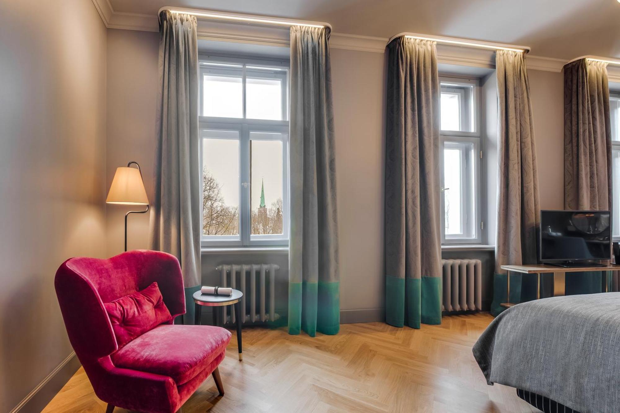 Grand Poet Hotel And Spa By Semarah Riga Ngoại thất bức ảnh A room at the hotel