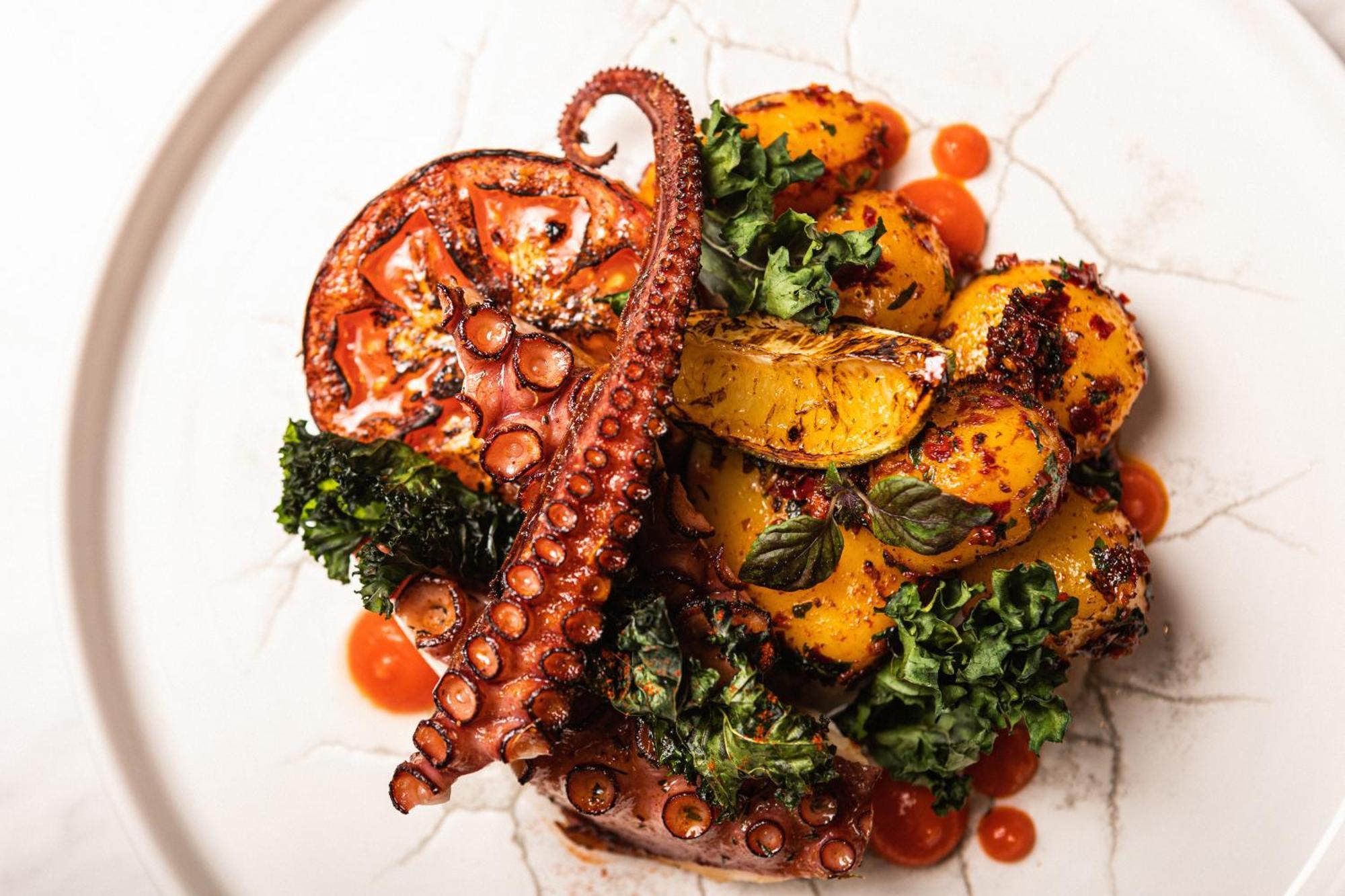 Grand Poet Hotel And Spa By Semarah Riga Ngoại thất bức ảnh A prepared octopus dish