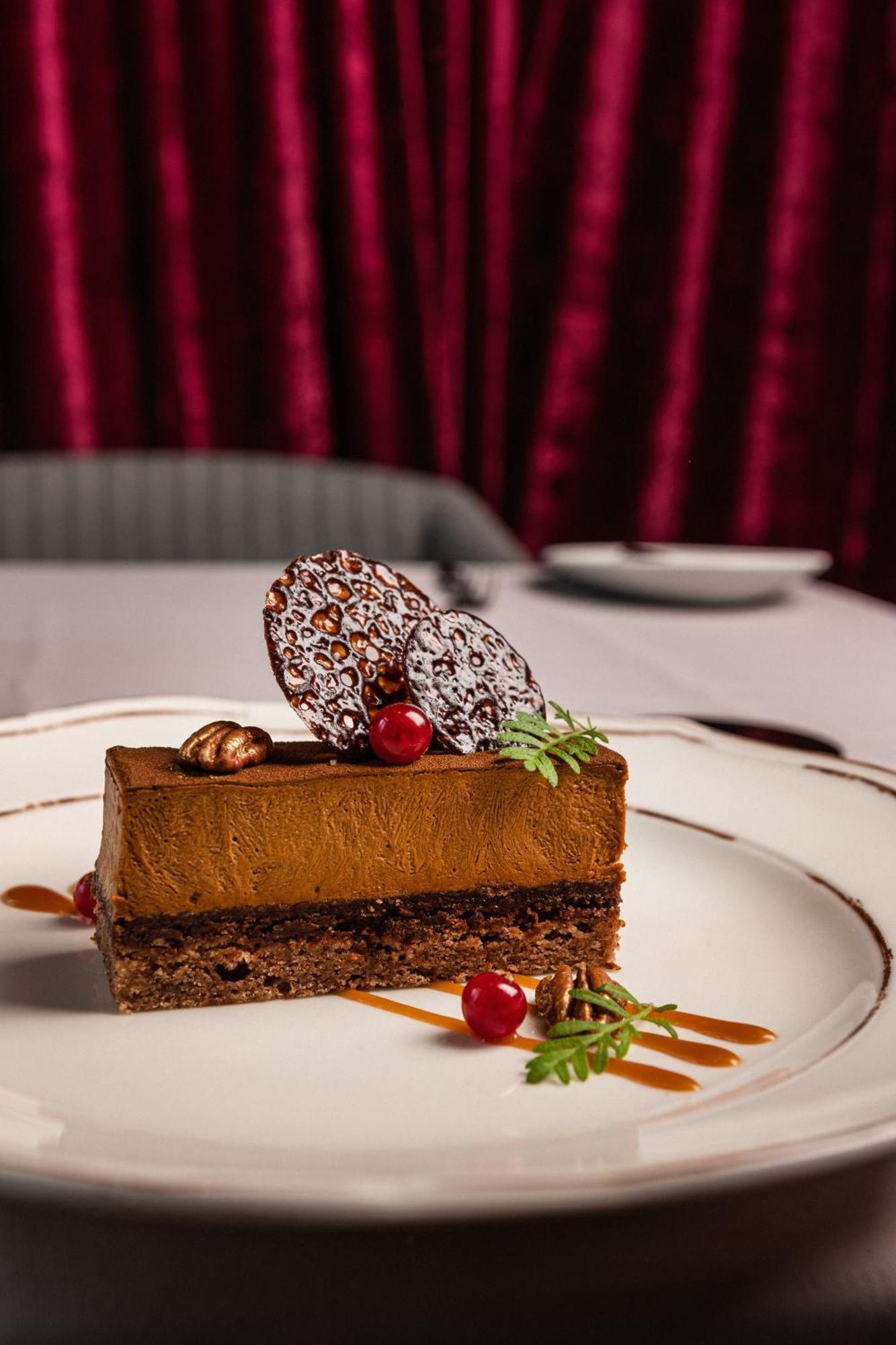 Grand Poet Hotel And Spa By Semarah Riga Ngoại thất bức ảnh A chocolate dessert